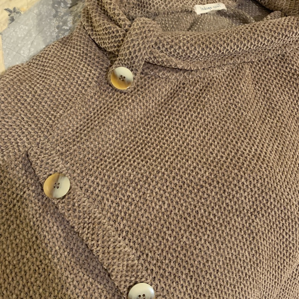 Cute comfortable sweater with eye catching details